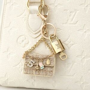 Authentic Louis Vuitton Lock & Key with unbranded Mini Tweed Bagcharm, Keycharm